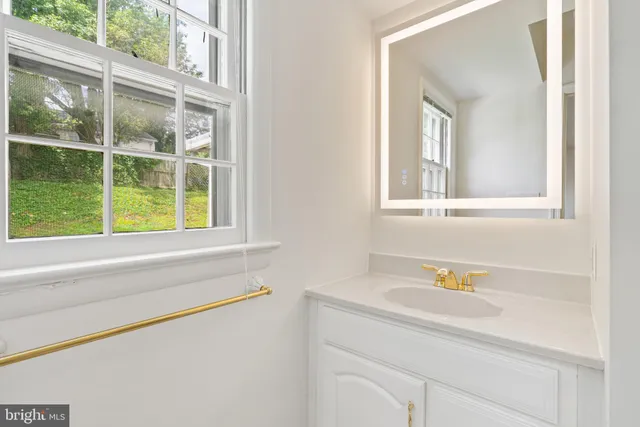 a bathroom with a sink and a bathtub