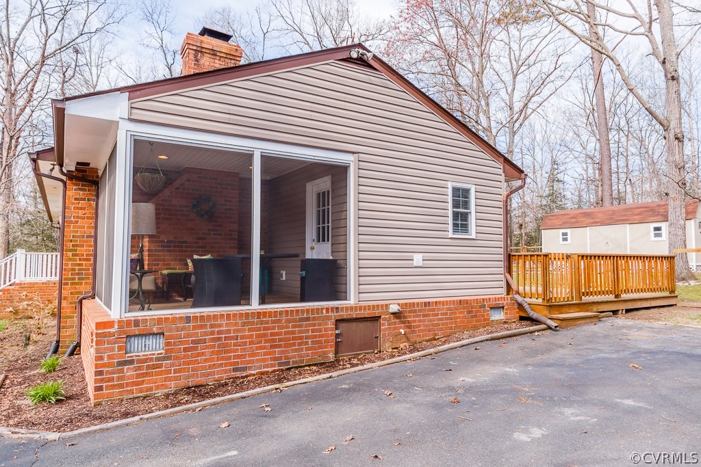 100 Riva Ridge Circle Sandston, VA 23150 - Photo 26 of 33 Side of home with screened in porch!