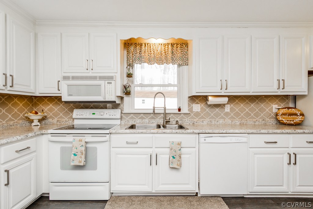 Kitchen with custom back splash and updated counte
