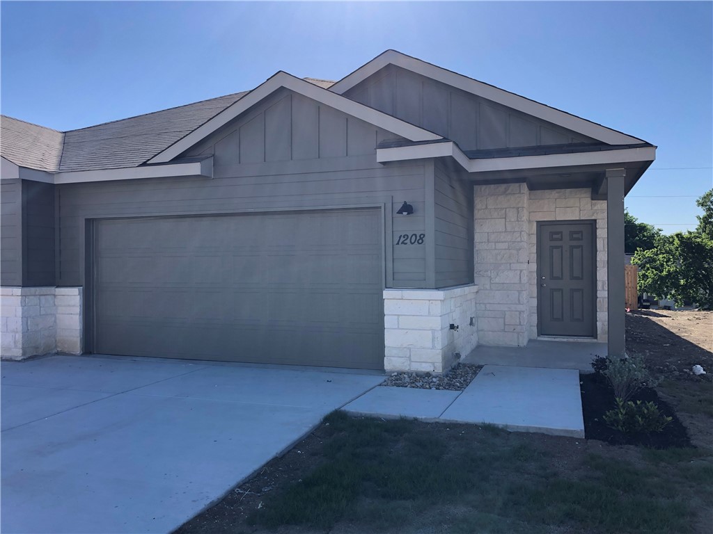 front view of a house with an outdoor space