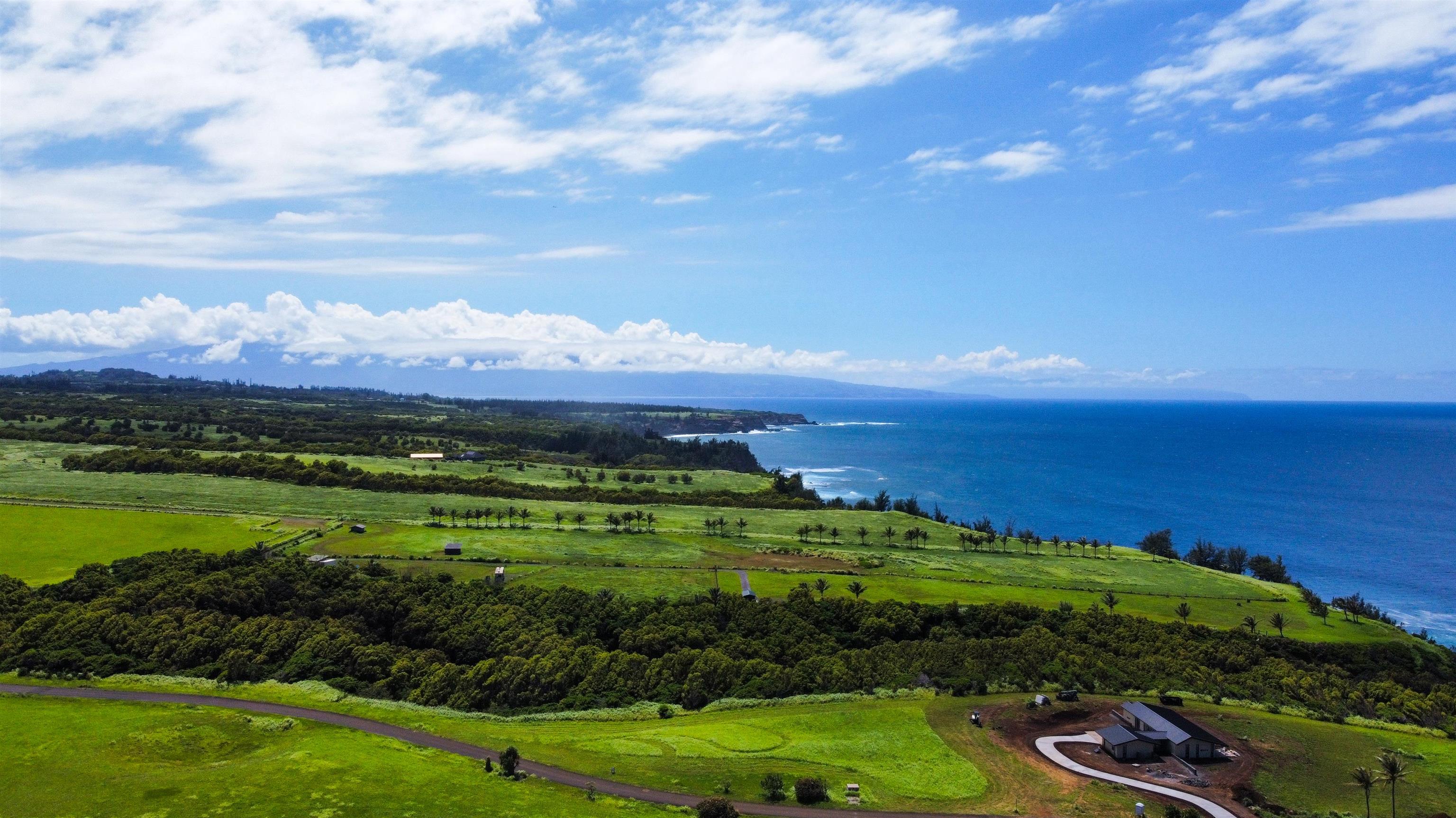 744 Kai Huki Circle, Unit LOT 9 Haiku, HI 96708 - Photo 10 of 24 a view of a city with mountains in the background