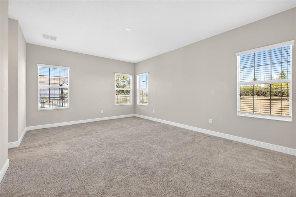 6394 Roadstead Court Apollo Beach, FL 33572 - Photo 19 of 49 an empty room with windows