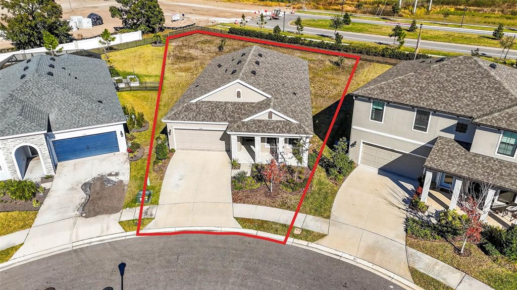 6394 Roadstead Court Apollo Beach, FL 33572 - Photo 2 of 49 an aerial view of a house with swimming pool