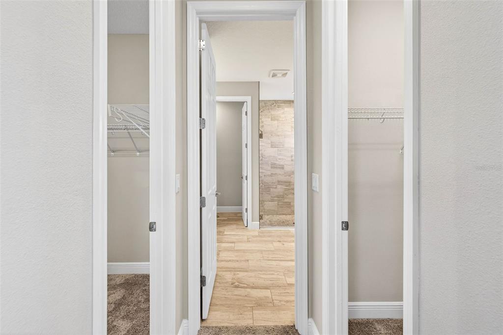 6394 Roadstead Court Apollo Beach, FL 33572 - Photo 21 of 49 a view of a bathroom from a corridor