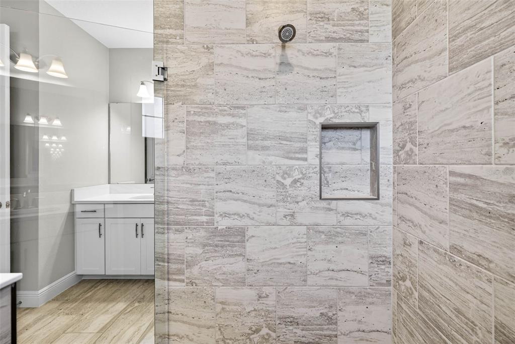 6394 Roadstead Court Apollo Beach, FL 33572 - Photo 25 of 49 a bathroom with a shower