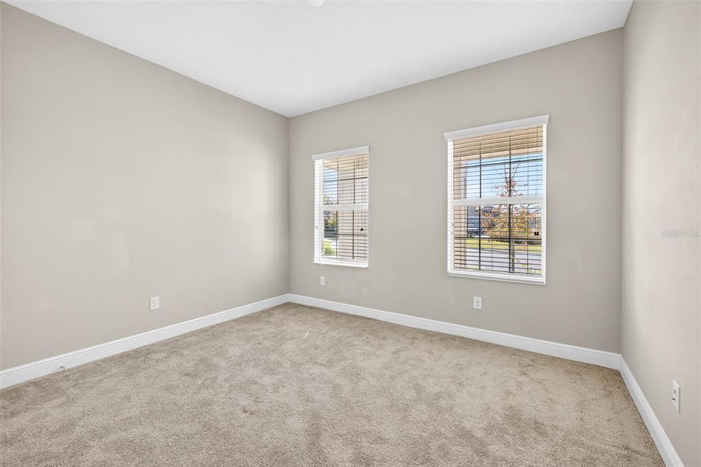 6394 Roadstead Court Apollo Beach, FL 33572 - Photo 28 of 49 an empty room with windows