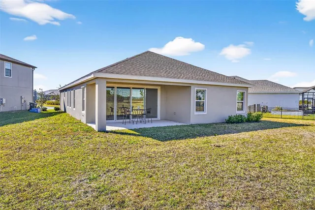 a swimming pool view with a lake view