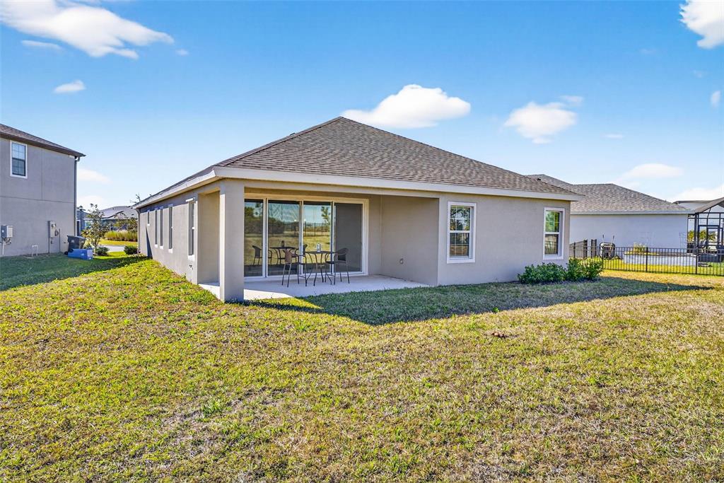 6394 Roadstead Court Apollo Beach, FL 33572 - Photo 34 of 49 a view of a house with backyard and sitting area
