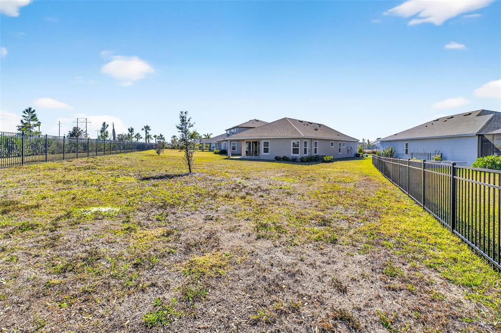 6394 Roadstead Court Apollo Beach, FL 33572 - Photo 35 of 49 a swimming pool view with a lake view
