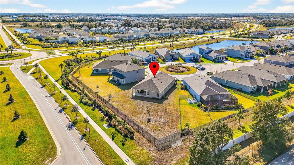 6394 Roadstead Court Apollo Beach, FL 33572 - Photo 37 of 49 an aerial view of a swimming pool with outdoor seating