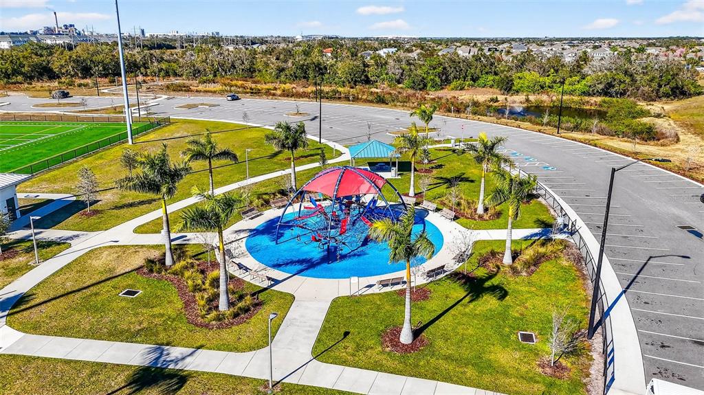 6394 Roadstead Court Apollo Beach, FL 33572 - Photo 48 of 49 a view of a swimming pool with a patio and lake view