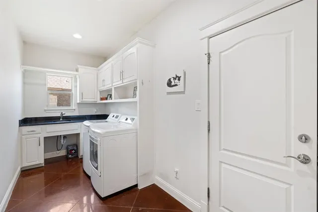 a view of a kitchen with electric appliances