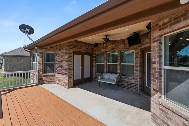 a view of a backyard with a patio