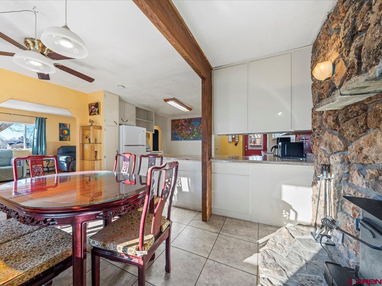 608 Bluff Street Delta, CO 81416 - Photo 6 of 45 a dining room with furniture and wooden floor