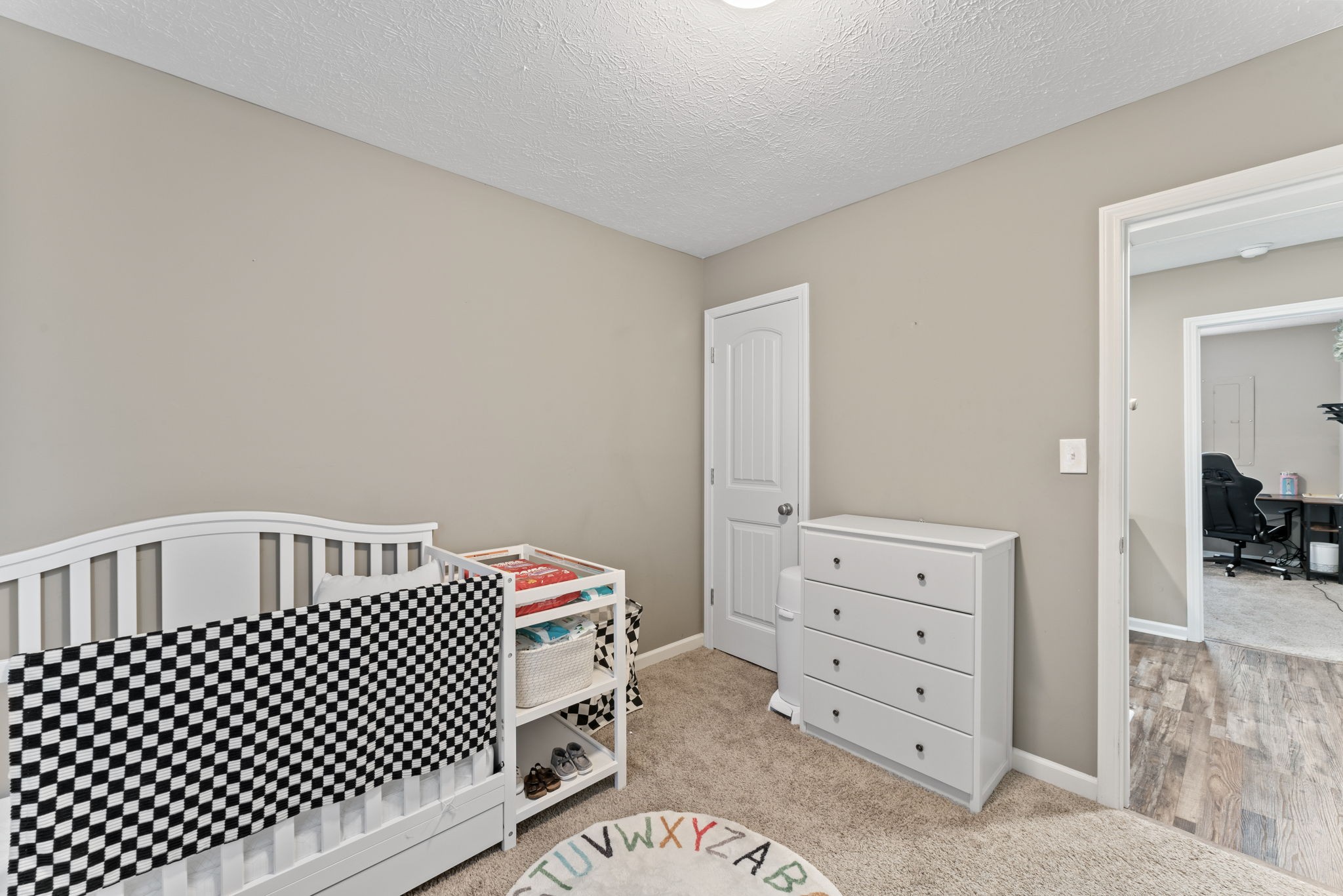 332 Oakwood Road Tullahoma, TN 37388 - Photo 12 of 17 a bedroom with a bed and dresser