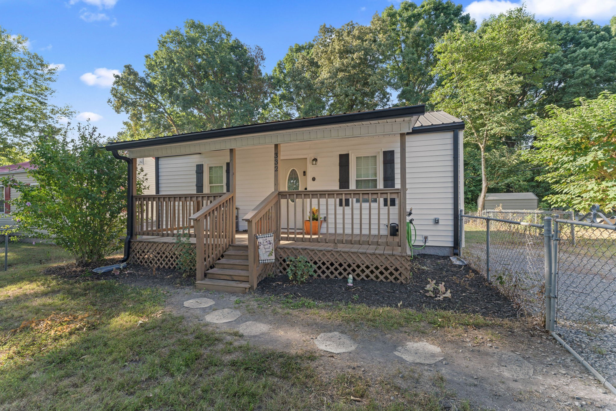 332 Oakwood Road Tullahoma, TN 37388 - Photo 3 of 17 a view of a house with a yard