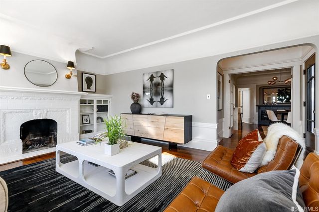 a kitchen with a table and chairs in it