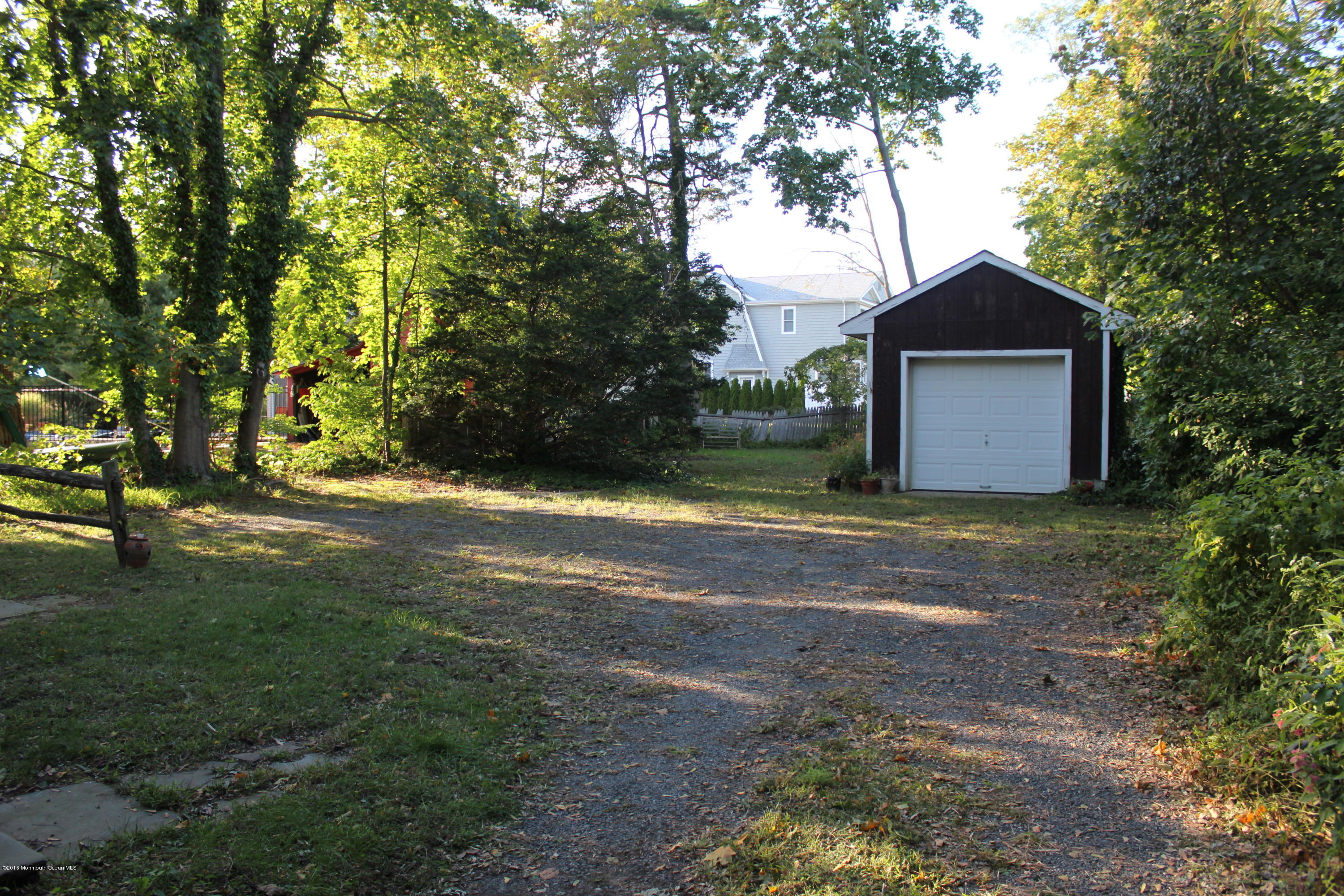 34 Ridge Road Rumson, NJ 07760 - Photo 1 of 3 a view of backyard of house with green space