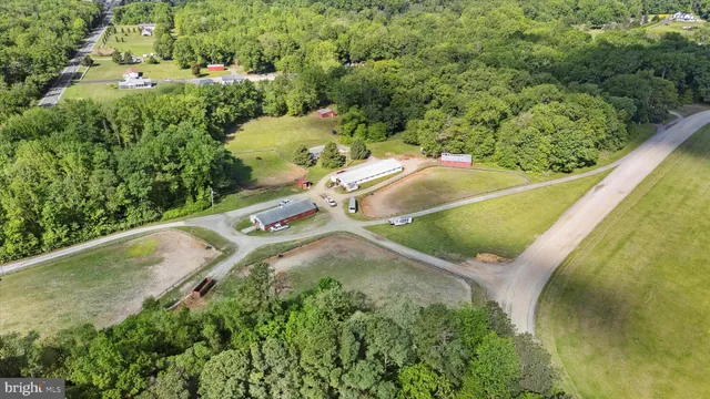 an aerial view of residential house with outdoor space