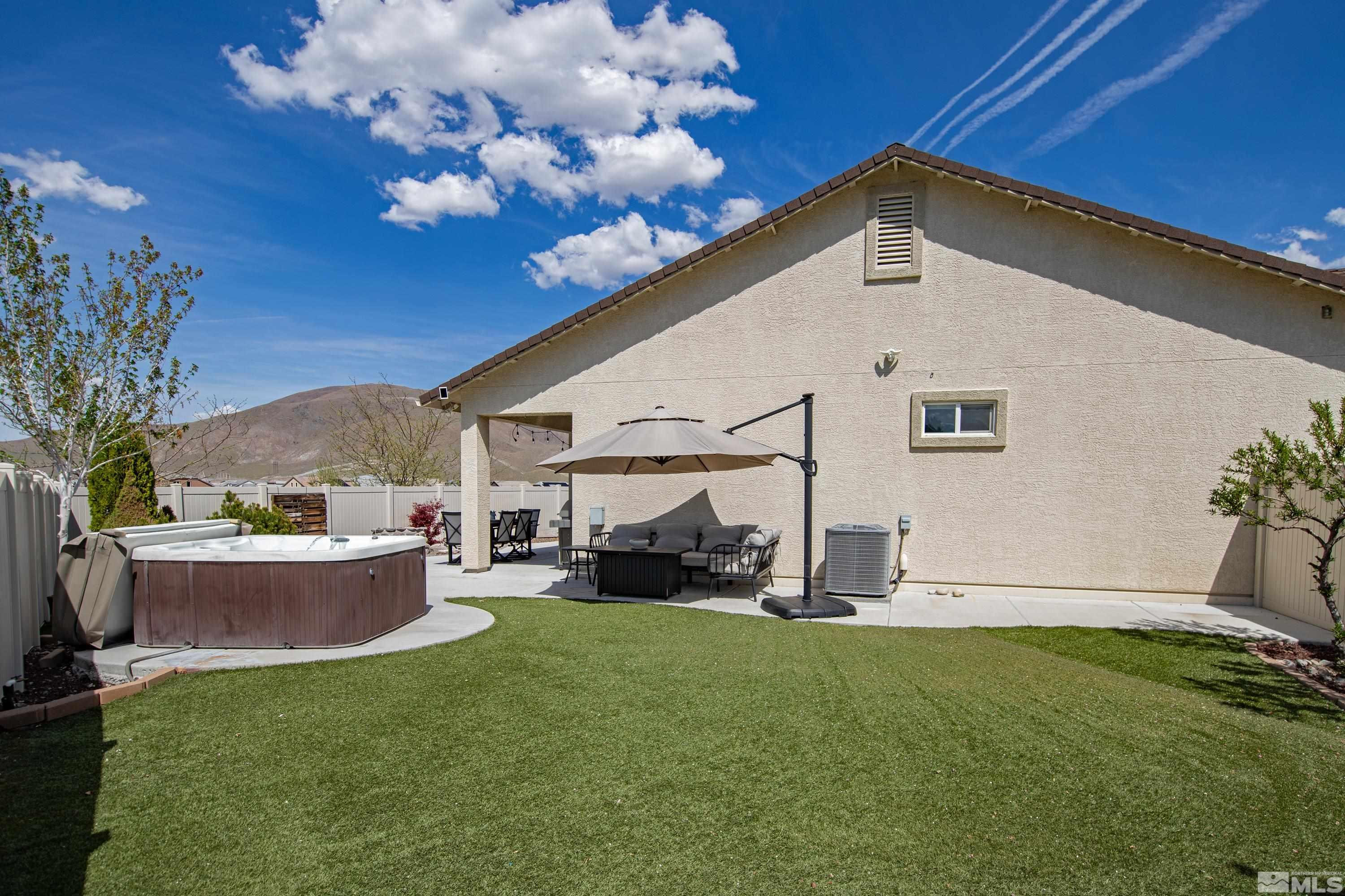 2255 Makenna Drive Reno, NV 89521 - Photo 28 of 34 a view of a house with backyard and sitting area