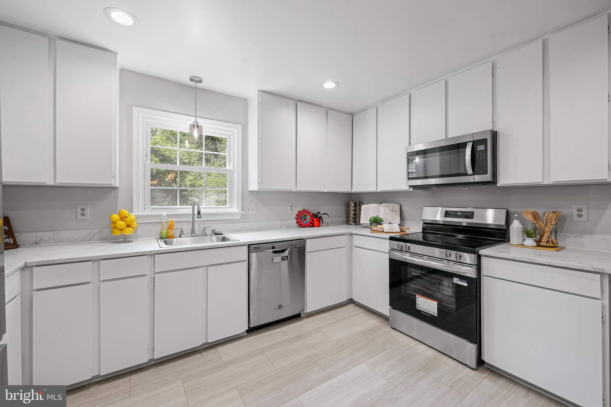 8070 Sleepy View Lane Springfield, VA 22153 - Photo 10 of 35 Large Kitchen with Stainless Steel Appliances