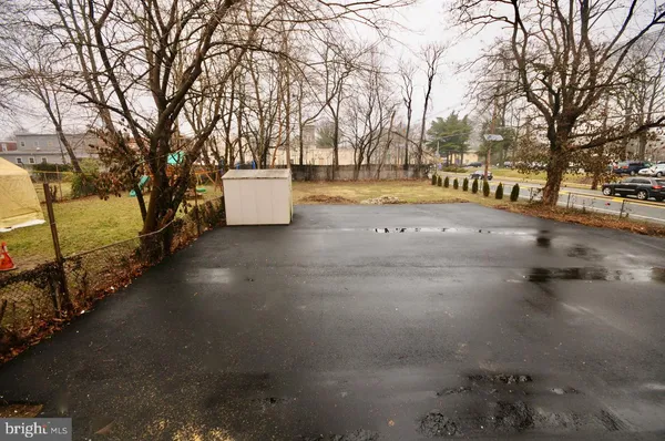 a view of a street with trees