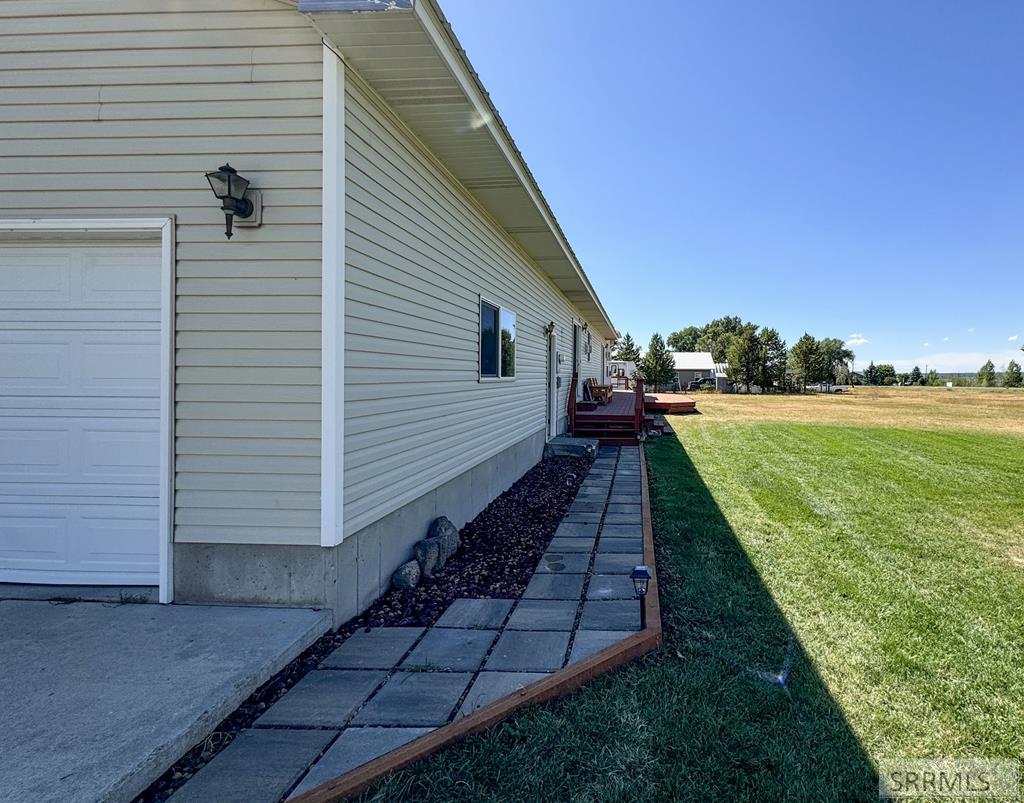 137 Spruce Street Ashton, ID 83420 - Photo 19 of 22 Sunny back yard looking to north