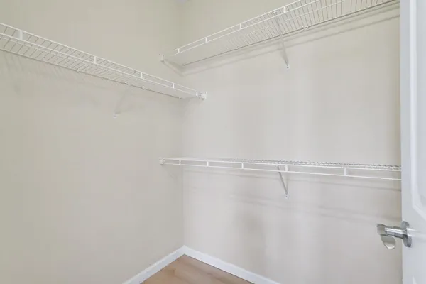 a view of a room with racks on the wall