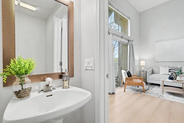 a bathroom with a sink and a mirror