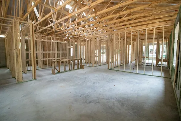 a view of an empty room with balcony