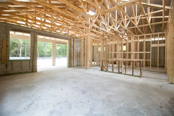 a view of an empty room with a balcony
