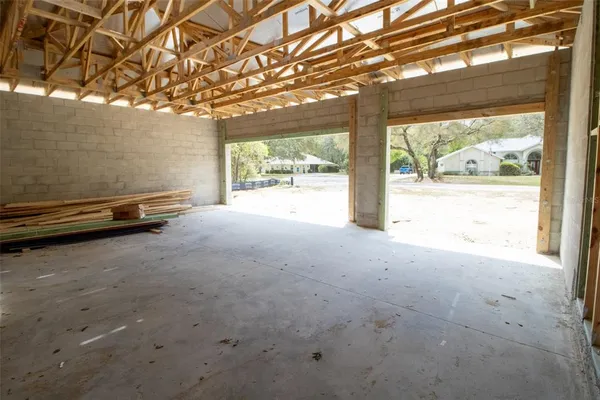a view of a room with a large window