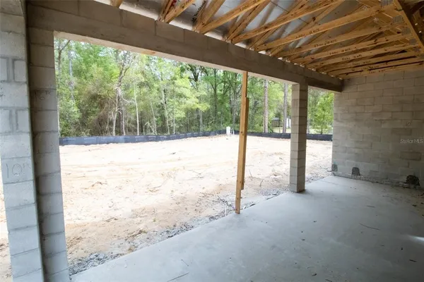 a view of large room with a porch
