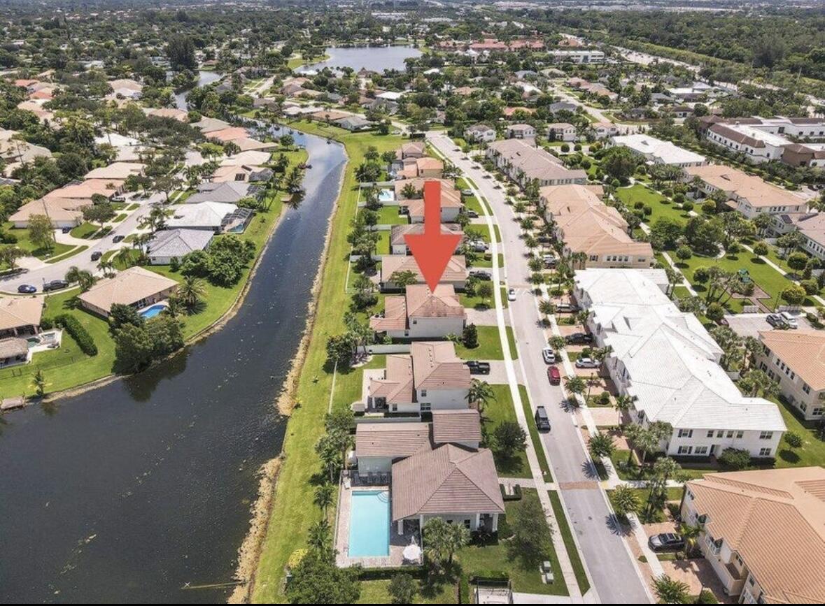 11971 Cypress Key Way Royal Palm Beach, FL 33411 - Photo 13 of 19 an aerial view of residential houses with outdoor space