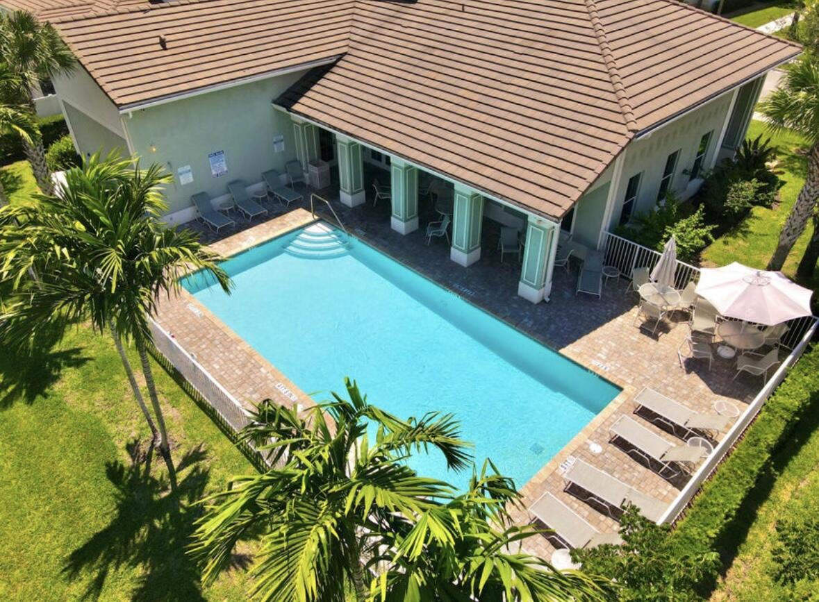 11971 Cypress Key Way Royal Palm Beach, FL 33411 - Photo 16 of 19 a backyard of a house with seating space