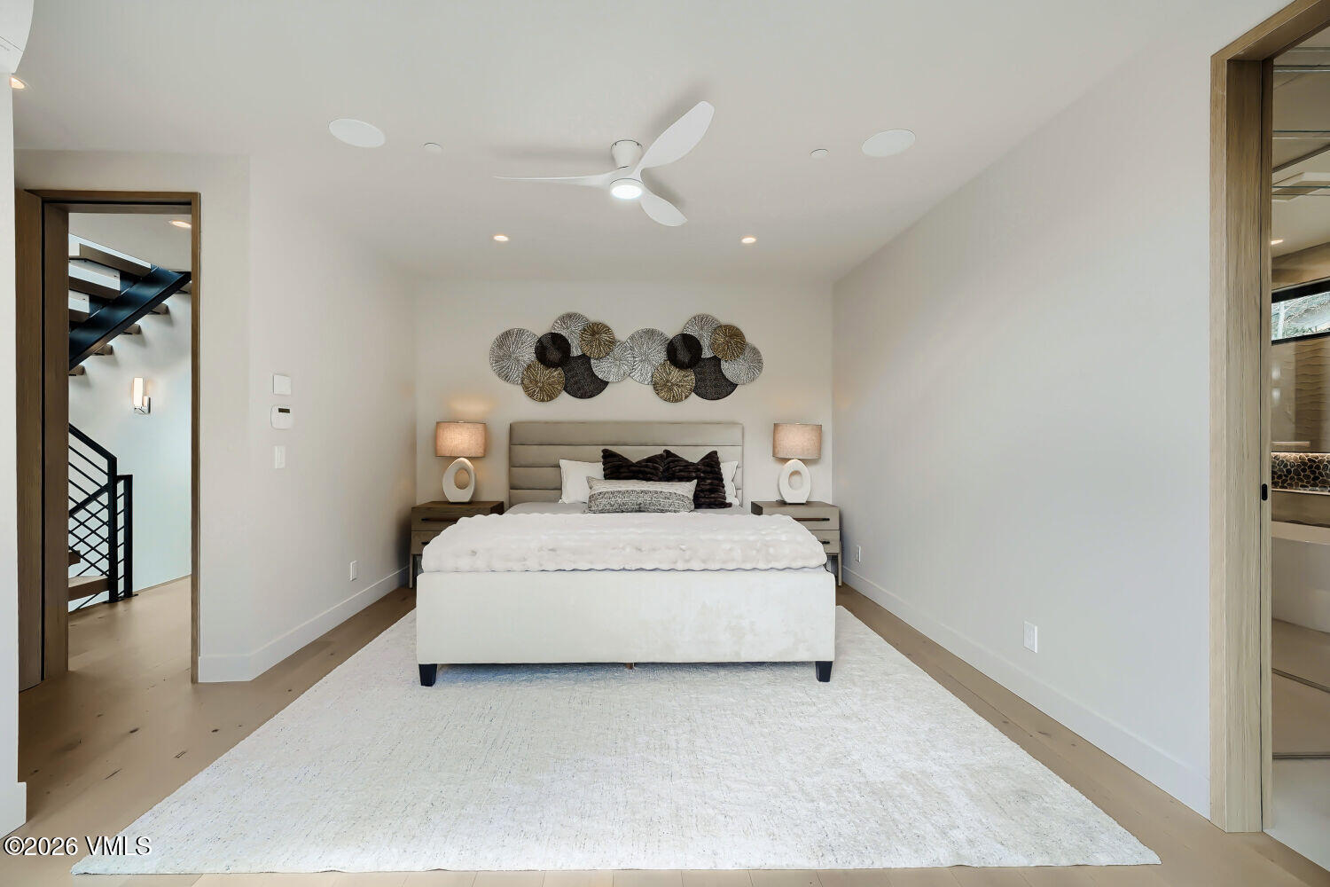 2811 Bald Mountain Road Vail, CO 81657 - Photo 30 of 59 a bed room with a bed and a painting