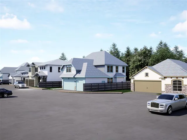 a view of a cars park in front of a house
