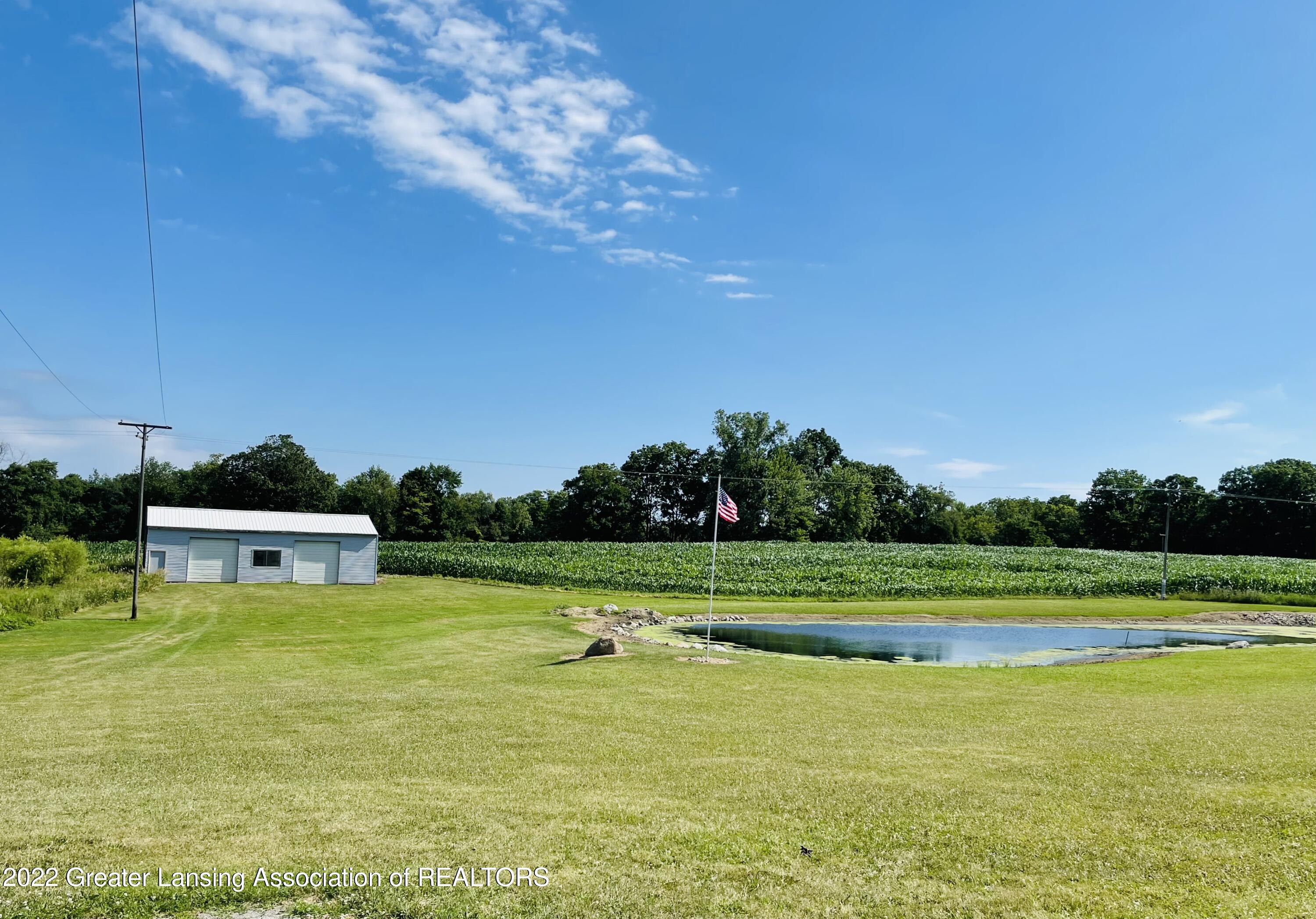2425 East Howell Road Williamston, MI 48895 - Photo 5 of 26 Pole Barn /Shared Pond