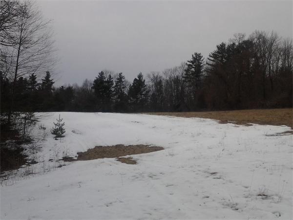34 Lackey Road Sutton, MA 01590 - Photo 1 of 2 a view of a covered with snow on the road