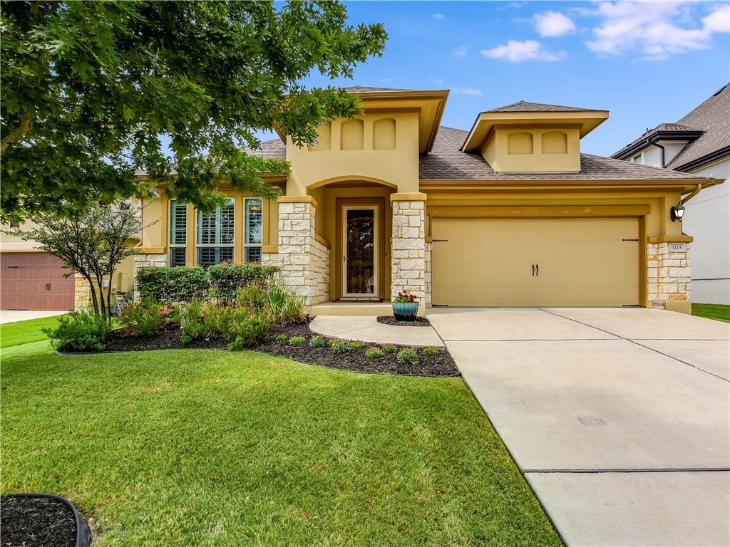 3213 Venezia View Leander, TX 78641 - Photo 1 of 1 a front view of a house with garden