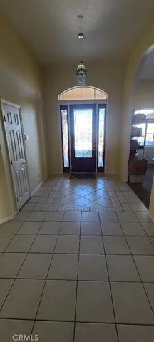 a view of entryway and hall with a window