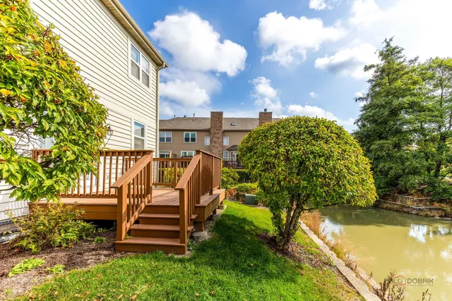 a view of a swimming pool with a deck