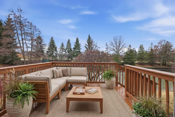 a bathroom with a double vanity sink mirror and a bathtub