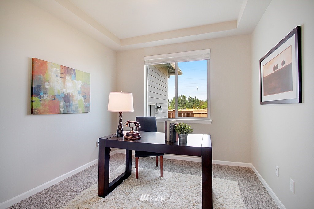 5202 Northeast 24th Street Renton, WA 98059 - Photo 11 of 22 a living room with furniture and a window