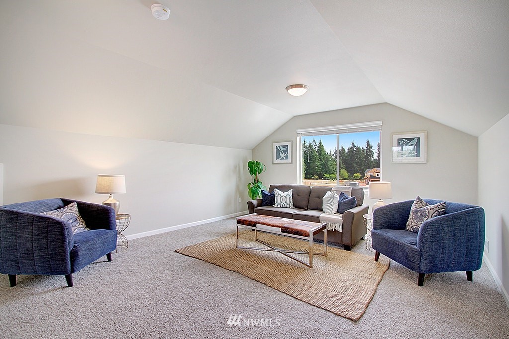 5202 Northeast 24th Street Renton, WA 98059 - Photo 12 of 22 a living room with furniture and a window