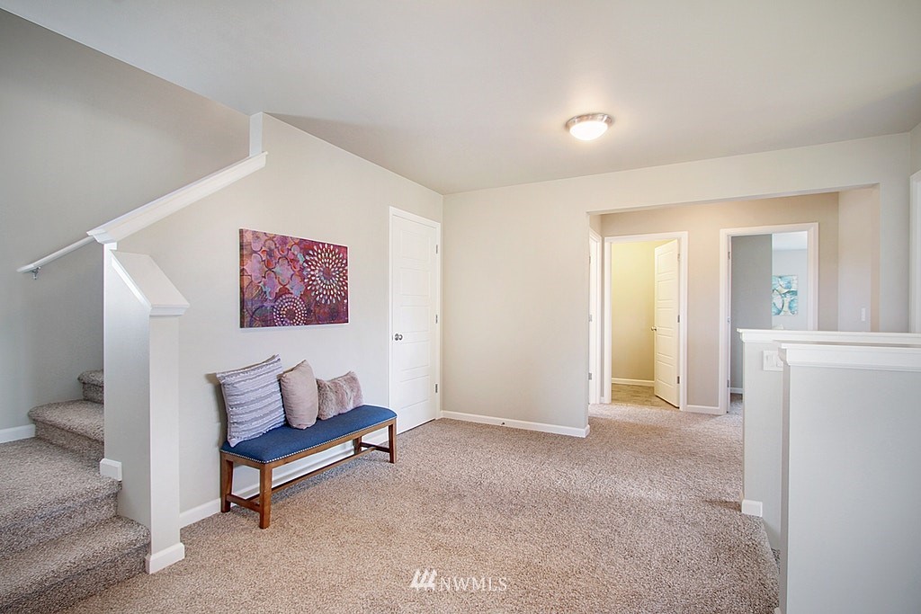 5202 Northeast 24th Street Renton, WA 98059 - Photo 20 of 22 a view of a livingroom with furniture and a couch