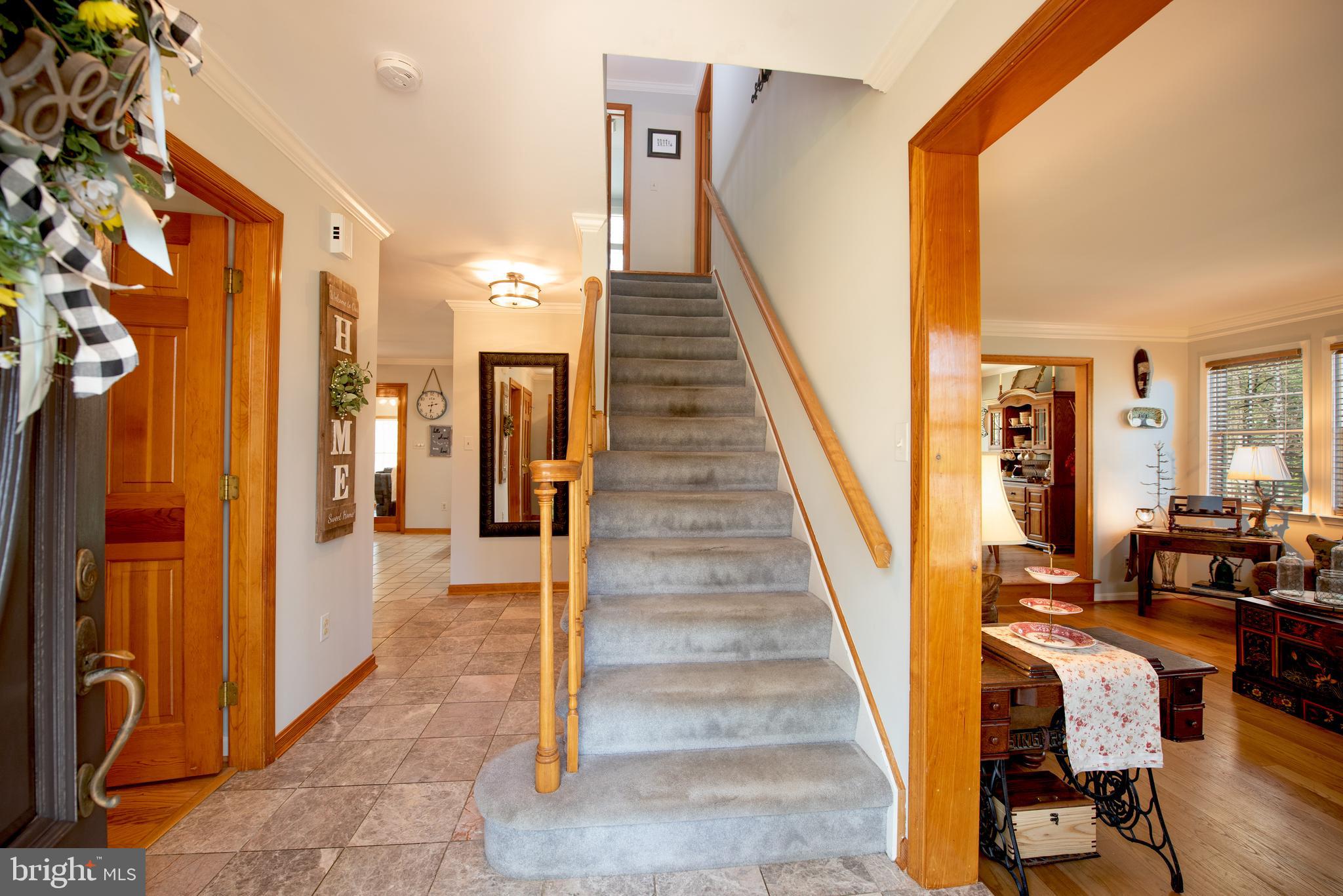 8524 Reservoir Road Fulton, MD 20759 - Photo 5 of 49 Entry with main level bedroom on right