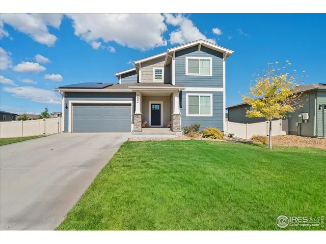 a black and white photo of a house