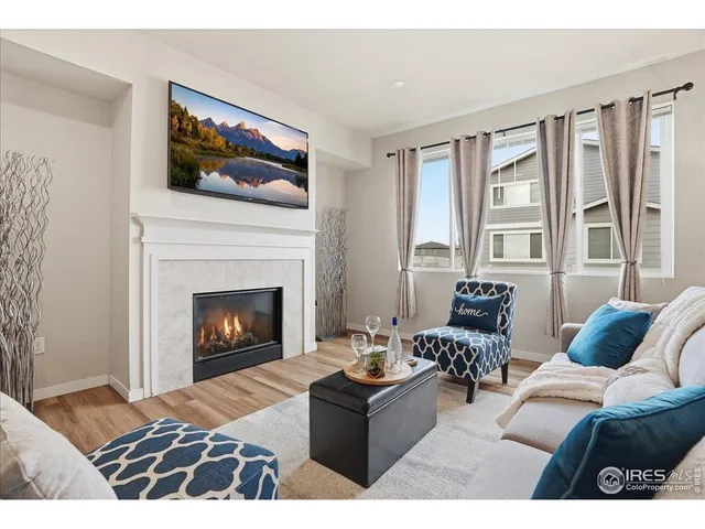 a bedroom with a bed and a lamp