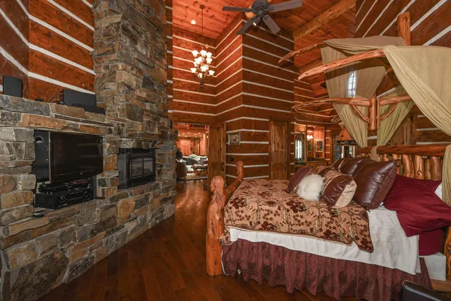 a bathroom with a shower and toilet